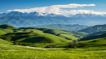 Fototapeta na wymiar Majestic Azerbaijani Landscape: Panoramic View of Green Hills and Snow-capped Mountains