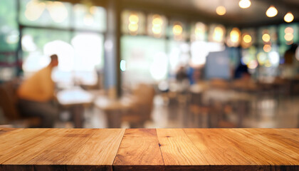 Selected focus empty brown wooden table and Coffee shop blur background with bokeh image, for product display montage; mock up to showcase design - obrazy, fototapety, plakaty