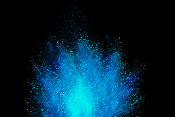 Abstract powder splatted background. Colorful powder explosion on black background. Colored cloud....