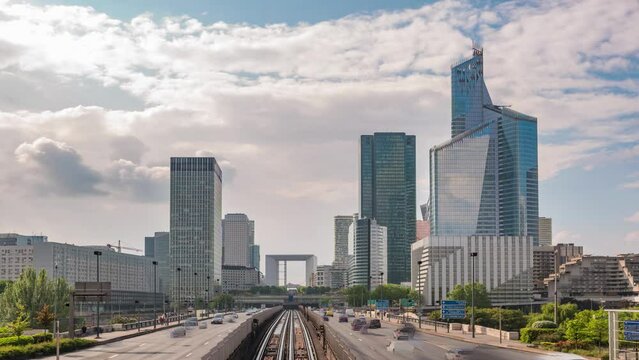 Paris France time lapse, city skyline at La Defense business district