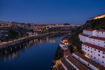 Fototapeta na wymiar Panoramic view of Douro river and Infante D Henrique bridge at night, Porto, Portugal
