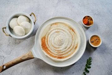 Dosa placed on a non stick ceramic  griddle tawa | Pancake crepe pan