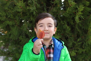 A happy and sweet Turkish boy. peaceful and handsome face. happiness. 