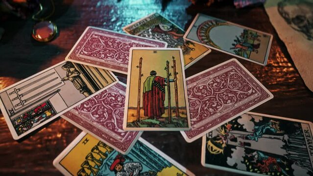 Helsinki, Finland - October 7, 2012. Witchcraft focus spiritual Card reading forecasting future opportunities. Witchcraft focus ritual forecasting success. Witchcraft focus spell forecasting progress.