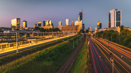 Warsaw, Poland - panorama of a city skyline at dusk with light trails. Cityscape view of Warsaw....