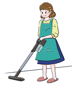 掃除機で掃除をする女性