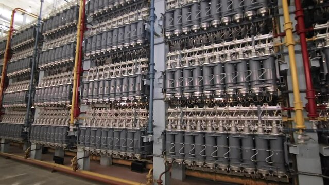 Electrochemical plant. Huge Amounts of Grey Gas Centrifuges for uranium isotope separation are Placed at the chemical Factory. Industrial Manufacturing. Production Chemicals facility.