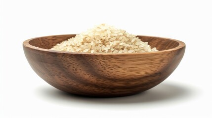 Uncooked dry rice in wooden bowl isolated on white