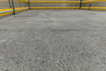 Concrete floor grinder and sanded ready for application with resin coating