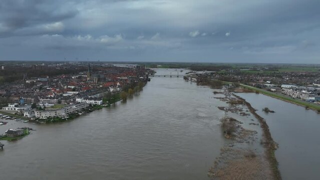 Aerial view on Kampen city at the river Ijssel whith flooded floodplains during winter in Overijssel, Netherlands