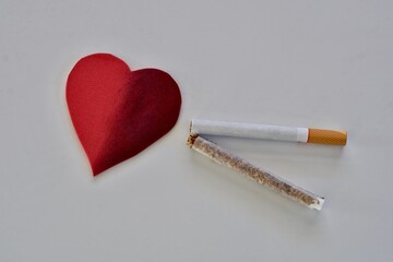 smoking destroys a red heart harmful to health
