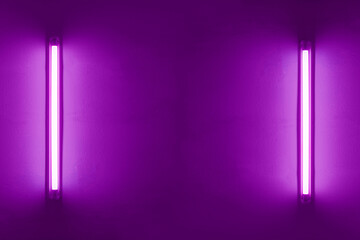 Two purple neon bulbs on white wall. Background texture of empty old wall with glowing purple neon...