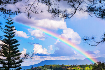 Rainbow in the sky in the countryside in the rainy season in thailand.