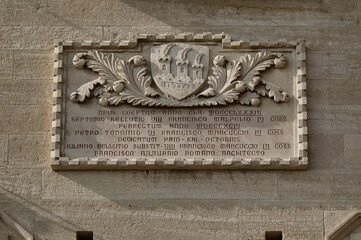 The Government Palace of the Republic of San Marino with the flag of San Marino flying from the balcony in the central square of the city