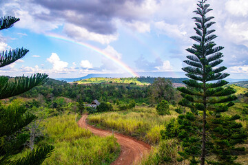 Rainbow in the sky in the countryside in the rainy season in thailand.
