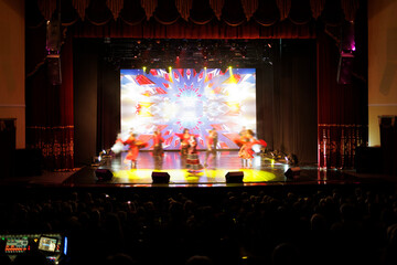 Сoncert on scene theater, stage light with colored spotlights and smoke.
