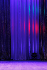 scene, a blue curtain theater 