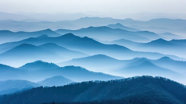 Misty blue mountain ranges in layers