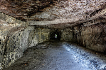 Natural tunnel at the site known as Los Tuneles near San Jose del Guaviare, Colombia - 748100106