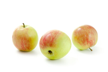 Three green apples isolated on white background with clipping path..