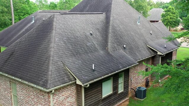 Roof with hail damage and markings from inspection