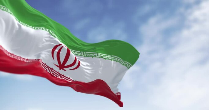 Islamic Republic of Iran national flag waving on a clear day