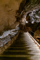 Obraz premium stairs leading up to the exit of the Cuevas del Drach caves in Porto Cristo in eastern Majorca