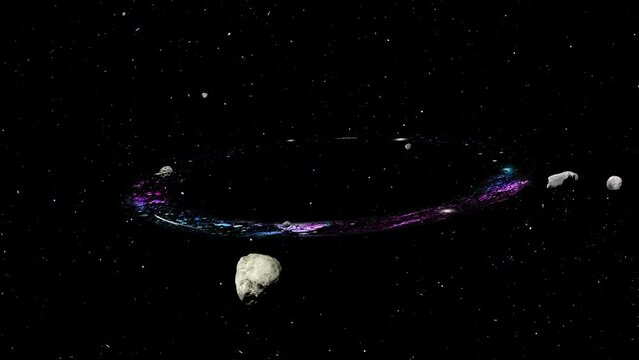 A ring of stars with flying asteroids rotates in space against the background of the starry sky. A beautiful swirling ring nebula with texture. 4K slow motion 3D loop animation.