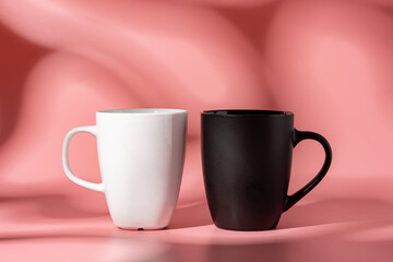 Ceramic mug mock up on pink background studio shot