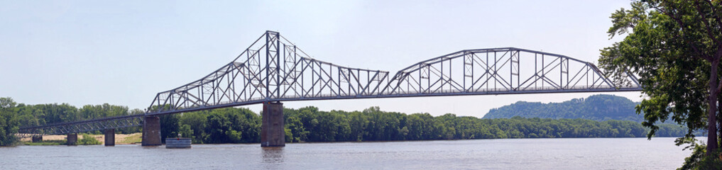 Wide Panorama, view from the North. Black Hawk Bridge over the Mississippi River, joining Lansing...