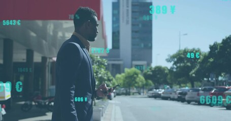Animation of financial data processing over african american man walking in sunny city street - Powered by Adobe