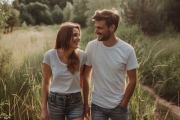 Happy couple talking while enjoying in walk in nature