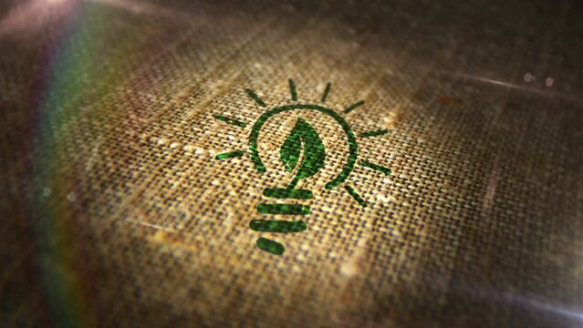 Eco friendly idea sign stamp on natural linen sack. Green energy and sustainable industry and technology 3D  design abstract concept. Looped and seamless animation.