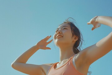Motivational scene of an Asian woman stretching blue sky blending with a pastel background...