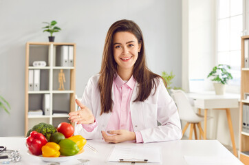 Nutritionist chats with her audience during online broadcast on her blog about healthy eating....
