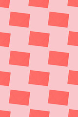 Pattern made of envelopes on a pink background. Creative concept.