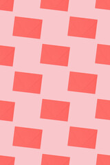 Pattern made of envelopes on a pink background. Creative concept.
