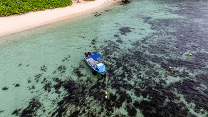 panoramic drone view of the coast of the Seychelles with bays and white catamarans