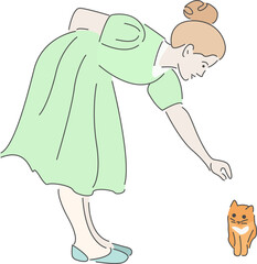 a girl in green dress with a kitten