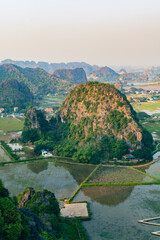 Sunset Views of of Dam sen Hang Mua in Northern Vietnam Overlooking the Ninh Binh Region of rice fields.  © Chris