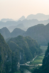 Viewpoint Đầm sen Hang múa is a popular spot for tourists visiting Tam Coc in the Ninh Binh region of Vietnam. In the background are the mountains and rice fields of the region. © Chris