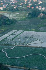 Sunset Views of of Dam sen Hang Mua in Northern Vietnam Overlooking the Ninh Binh Region of rice fields.  © Chris