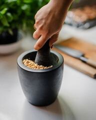 nuts crushed with pestle