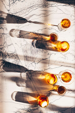 Cocktails in vintage and modern Glassware in direct sunset