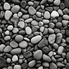 Fototapeta na wymiar Black and white pebbles background. Abstract background of stones. Travel and vacation concept with copy space. Spa Concept.