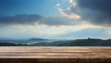 Empty wooden table for product display with a background of sky during rain