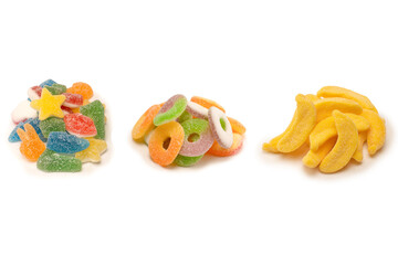Assorted gummy candies isolated on a white background. Top view.