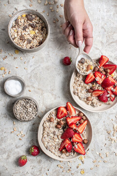 Porridge with strawberries and hazelnuts