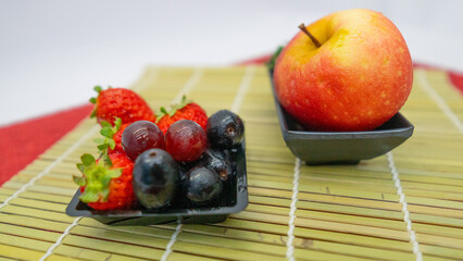 Brazilian Tropical Fruits apple, grape and strawberry