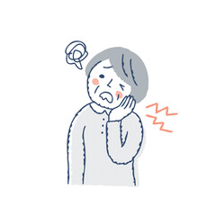 歯が痛くて困っているシニア女性